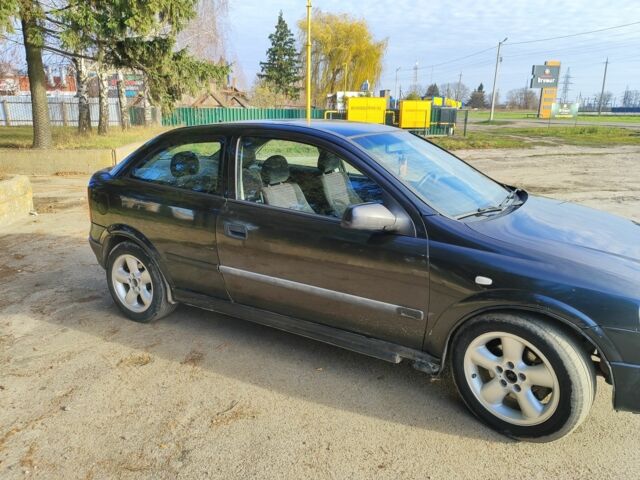 Черный Опель Астра, объемом двигателя 2 л и пробегом 299 тыс. км за 2141 $, фото 2 на Automoto.ua