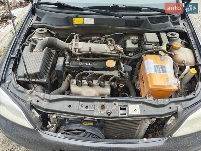Черный Опель Астра, объемом двигателя 1.6 л и пробегом 200 тыс. км за 2700 $, фото 9 на Automoto.ua