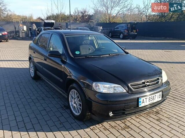 Черный Опель Астра, объемом двигателя 1.6 л и пробегом 240 тыс. км за 3700 $, фото 1 на Automoto.ua