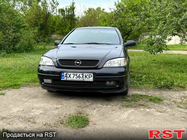 Черный Опель Астра, объемом двигателя 1.6 л и пробегом 250 тыс. км за 3600 $, фото 2 на Automoto.ua