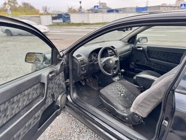 Черный Опель Астра, объемом двигателя 1.6 л и пробегом 258 тыс. км за 1350 $, фото 7 на Automoto.ua