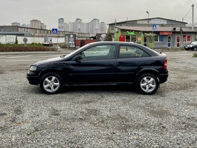 Черный Опель Астра, объемом двигателя 1.6 л и пробегом 258 тыс. км за 1350 $, фото 5 на Automoto.ua