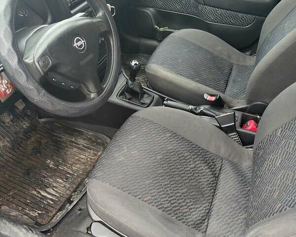 Черный Опель Астра, объемом двигателя 1.6 л и пробегом 200 тыс. км за 2700 $, фото 5 на Automoto.ua