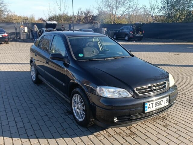 Черный Опель Астра, объемом двигателя 1.6 л и пробегом 250 тыс. км за 4000 $, фото 6 на Automoto.ua