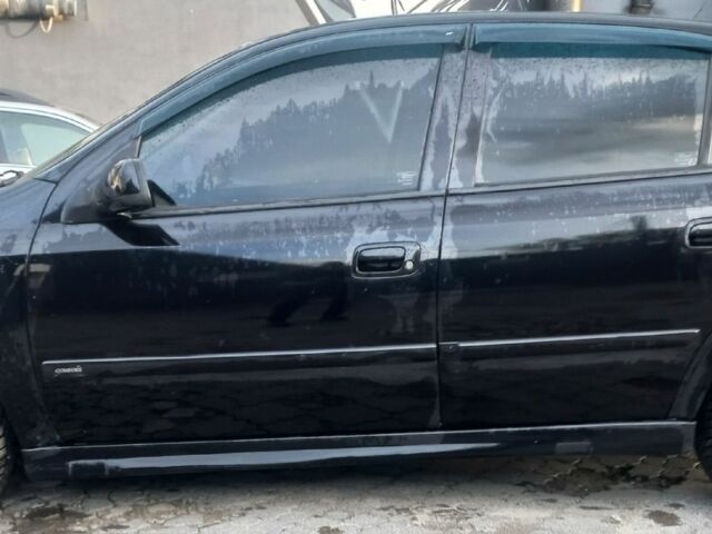 Черный Опель Астра, объемом двигателя 1.6 л и пробегом 2 тыс. км за 3025 $, фото 4 на Automoto.ua