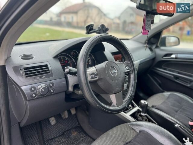 Черный Опель Астра, объемом двигателя 1.7 л и пробегом 270 тыс. км за 3499 $, фото 20 на Automoto.ua