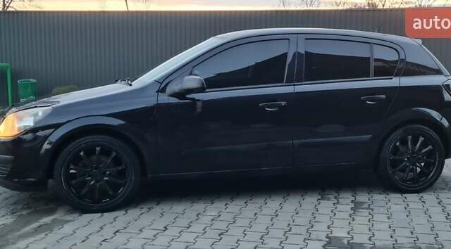 Черный Опель Астра, объемом двигателя 1.4 л и пробегом 300 тыс. км за 3350 $, фото 2 на Automoto.ua
