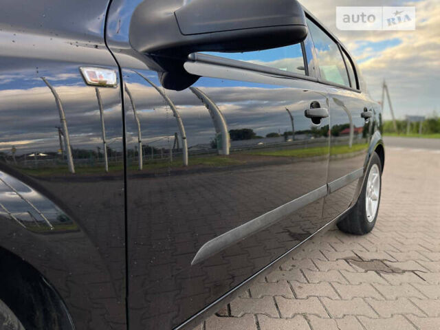 Черный Опель Астра, объемом двигателя 1.4 л и пробегом 128 тыс. км за 5099 $, фото 22 на Automoto.ua