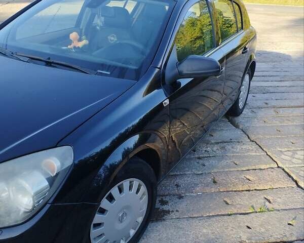 Черный Опель Астра, объемом двигателя 1.8 л и пробегом 190 тыс. км за 5500 $, фото 4 на Automoto.ua