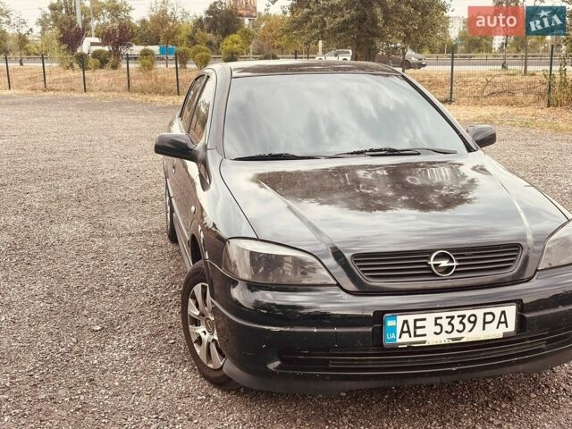 Черный Опель Астра, объемом двигателя 1.4 л и пробегом 180 тыс. км за 2600 $, фото 7 на Automoto.ua