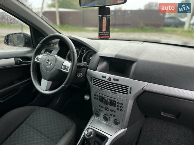 Черный Опель Астра, объемом двигателя 1.4 л и пробегом 212 тыс. км за 5200 $, фото 46 на Automoto.ua