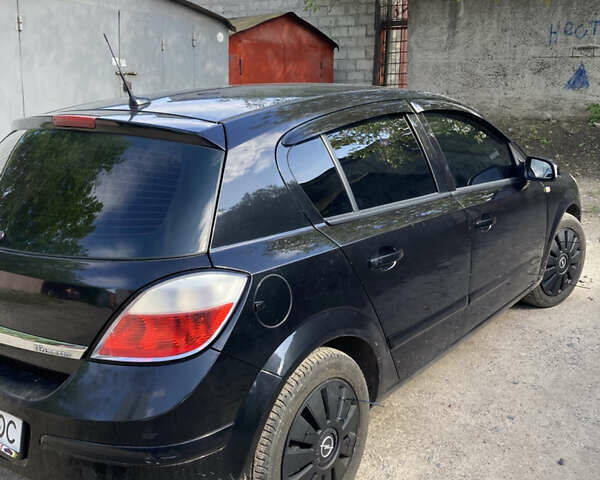 Черный Опель Астра, объемом двигателя 1.6 л и пробегом 316 тыс. км за 3999 $, фото 1 на Automoto.ua