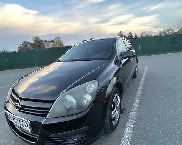 Черный Опель Астра, объемом двигателя 1.8 л и пробегом 219 тыс. км за 3700 $, фото 5 на Automoto.ua