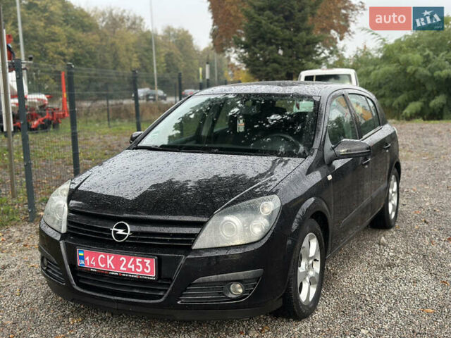 Черный Опель Астра, объемом двигателя 1.4 л и пробегом 212 тыс. км за 5200 $, фото 6 на Automoto.ua