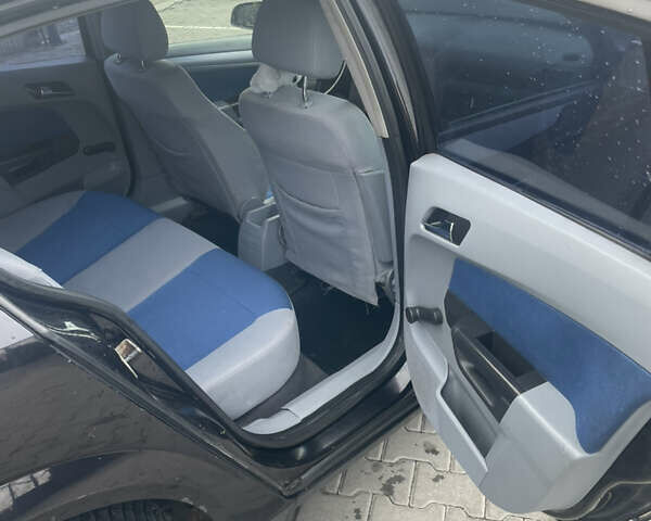 Чорний Опель Астра, об'ємом двигуна 1.6 л та пробігом 273 тис. км за 4000 $, фото 13 на Automoto.ua