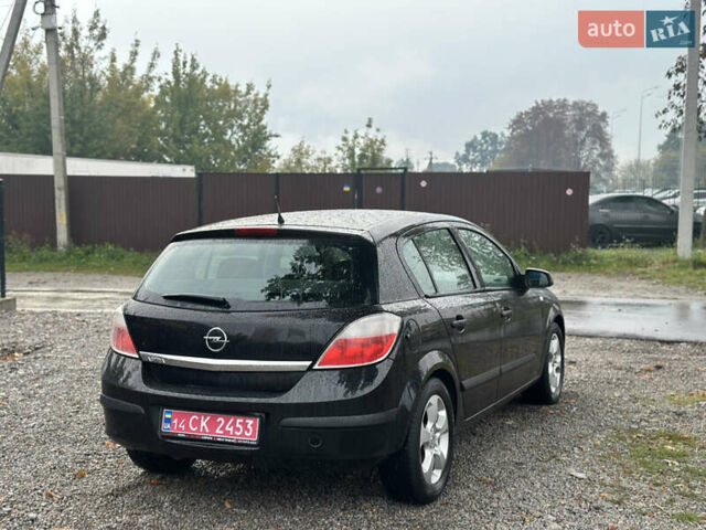 Черный Опель Астра, объемом двигателя 1.4 л и пробегом 212 тыс. км за 5200 $, фото 21 на Automoto.ua