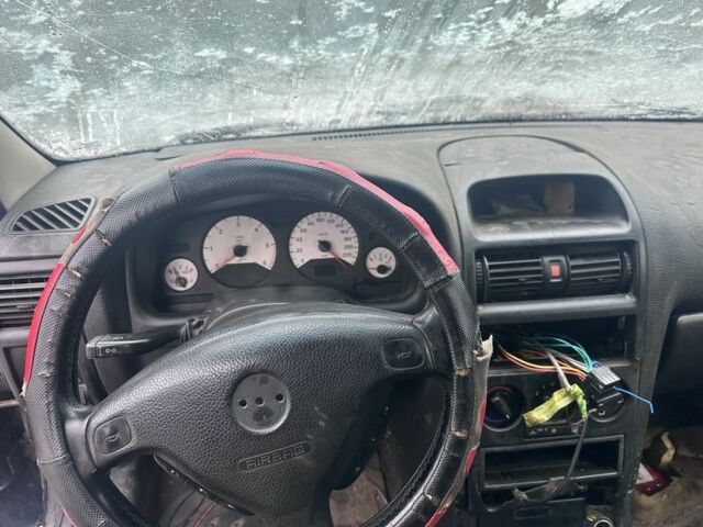 Чорний Опель Астра, об'ємом двигуна 0 л та пробігом 250 тис. км за 786 $, фото 8 на Automoto.ua