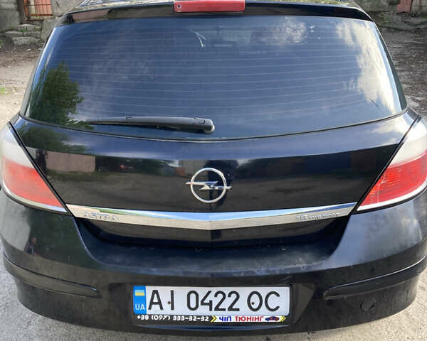 Черный Опель Астра, объемом двигателя 1.6 л и пробегом 316 тыс. км за 3999 $, фото 5 на Automoto.ua