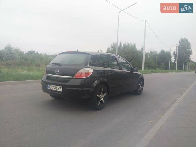 Черный Опель Астра, объемом двигателя 1.4 л и пробегом 238 тыс. км за 5000 $, фото 3 на Automoto.ua