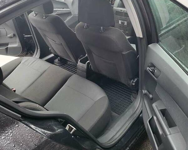 Черный Опель Астра, объемом двигателя 1.8 л и пробегом 227 тыс. км за 4700 $, фото 6 на Automoto.ua