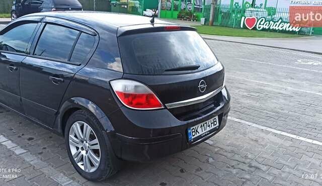 Черный Опель Астра, объемом двигателя 1.8 л и пробегом 210 тыс. км за 5300 $, фото 6 на Automoto.ua
