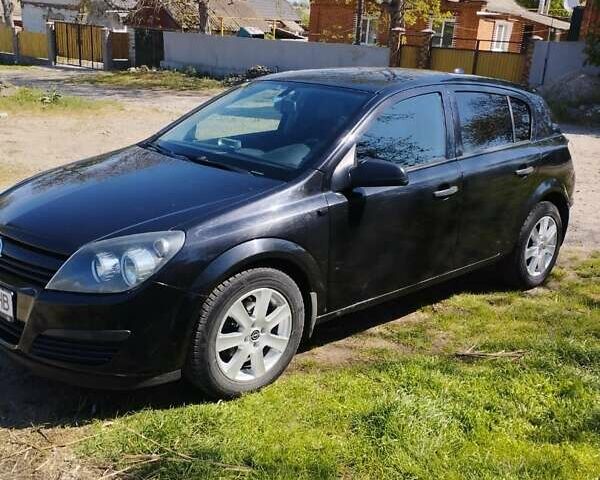 Черный Опель Астра, объемом двигателя 1.6 л и пробегом 265 тыс. км за 4500 $, фото 2 на Automoto.ua
