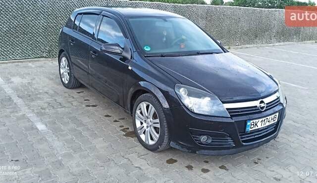 Черный Опель Астра, объемом двигателя 1.8 л и пробегом 210 тыс. км за 5300 $, фото 13 на Automoto.ua
