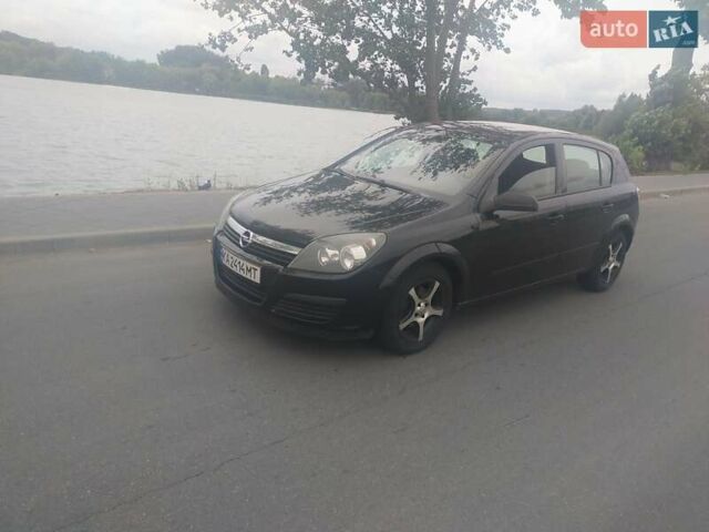 Черный Опель Астра, объемом двигателя 1.4 л и пробегом 238 тыс. км за 5000 $, фото 2 на Automoto.ua