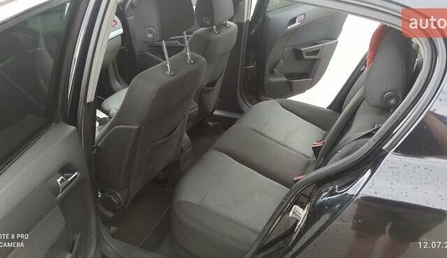 Черный Опель Астра, объемом двигателя 1.8 л и пробегом 210 тыс. км за 5300 $, фото 7 на Automoto.ua