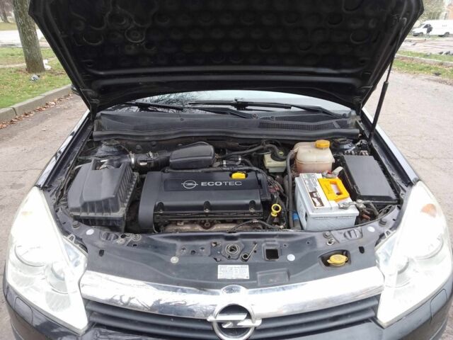 Черный Опель Астра, объемом двигателя 1.6 л и пробегом 255 тыс. км за 4200 $, фото 7 на Automoto.ua