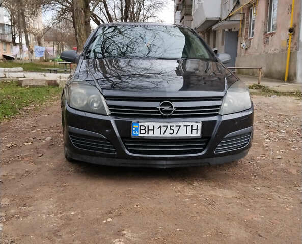 Черный Опель Астра, объемом двигателя 1.4 л и пробегом 200 тыс. км за 4700 $, фото 5 на Automoto.ua