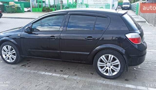 Черный Опель Астра, объемом двигателя 1.8 л и пробегом 210 тыс. км за 5300 $, фото 5 на Automoto.ua