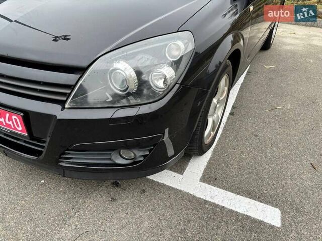 Черный Опель Астра, объемом двигателя 1.8 л и пробегом 184 тыс. км за 4800 $, фото 11 на Automoto.ua