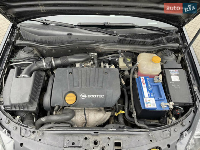 Черный Опель Астра, объемом двигателя 1.8 л и пробегом 227 тыс. км за 4900 $, фото 30 на Automoto.ua