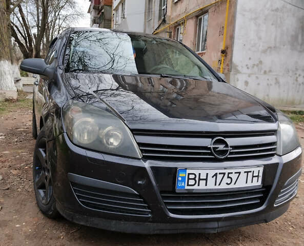 Черный Опель Астра, объемом двигателя 1.4 л и пробегом 200 тыс. км за 4700 $, фото 4 на Automoto.ua