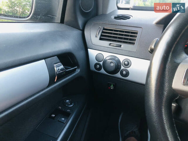 Черный Опель Астра, объемом двигателя 1.8 л и пробегом 375 тыс. км за 5100 $, фото 6 на Automoto.ua