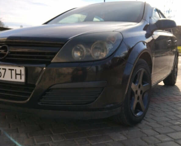 Черный Опель Астра, объемом двигателя 1.4 л и пробегом 200 тыс. км за 4700 $, фото 6 на Automoto.ua