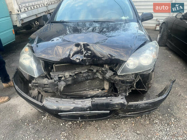 Черный Опель Астра, объемом двигателя 1.8 л и пробегом 300 тыс. км за 2200 $, фото 3 на Automoto.ua