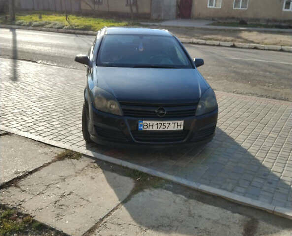 Черный Опель Астра, объемом двигателя 1.4 л и пробегом 200 тыс. км за 4700 $, фото 1 на Automoto.ua