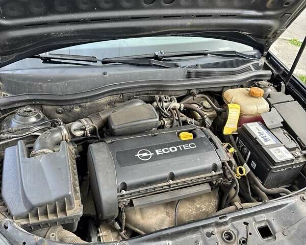 Чорний Опель Астра, об'ємом двигуна 1.6 л та пробігом 214 тис. км за 4550 $, фото 5 на Automoto.ua