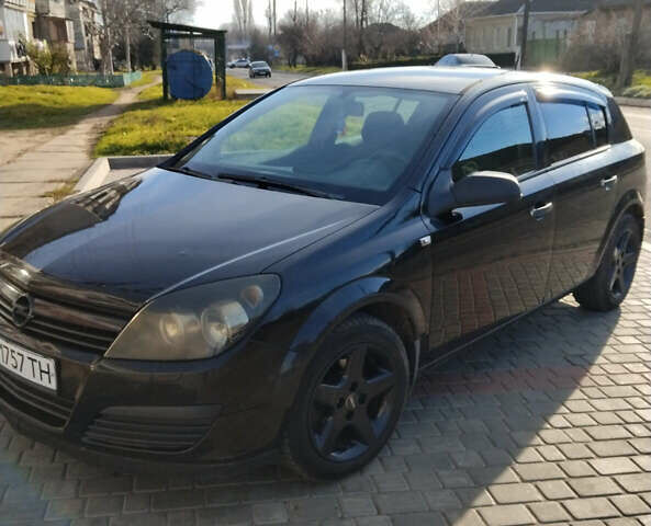 Черный Опель Астра, объемом двигателя 1.4 л и пробегом 200 тыс. км за 4700 $, фото 2 на Automoto.ua