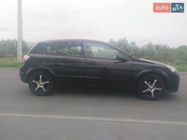 Черный Опель Астра, объемом двигателя 1.4 л и пробегом 238 тыс. км за 5000 $, фото 27 на Automoto.ua
