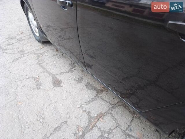 Черный Опель Астра, объемом двигателя 1.6 л и пробегом 270 тыс. км за 3900 $, фото 10 на Automoto.ua