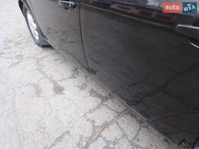 Черный Опель Астра, объемом двигателя 1.6 л и пробегом 270 тыс. км за 3900 $, фото 9 на Automoto.ua
