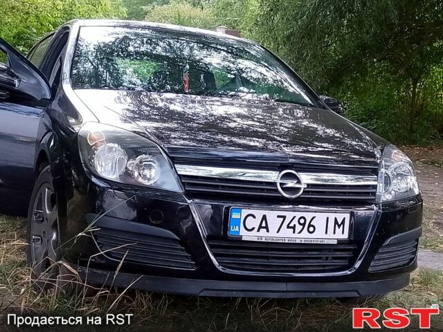 Черный Опель Астра, объемом двигателя 1.4 л и пробегом 203 тыс. км за 4800 $, фото 4 на Automoto.ua