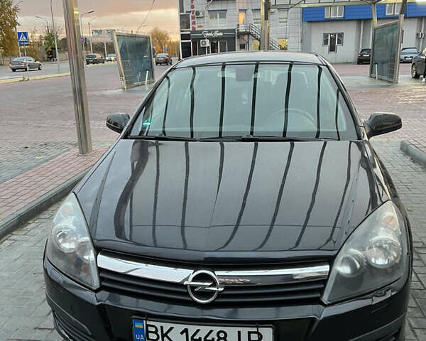 Черный Опель Астра, объемом двигателя 1.8 л и пробегом 165 тыс. км за 5500 $, фото 11 на Automoto.ua