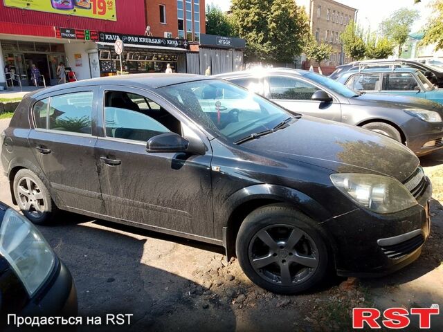 Черный Опель Астра, объемом двигателя 1.4 л и пробегом 203 тыс. км за 4800 $, фото 6 на Automoto.ua