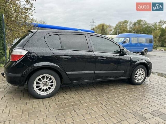 Черный Опель Астра, объемом двигателя 1.4 л и пробегом 274 тыс. км за 3777 $, фото 10 на Automoto.ua