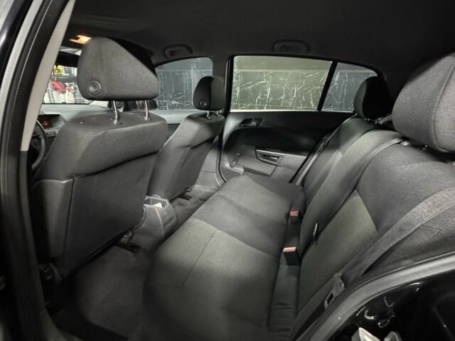 Черный Опель Астра, объемом двигателя 1.4 л и пробегом 220 тыс. км за 4500 $, фото 2 на Automoto.ua