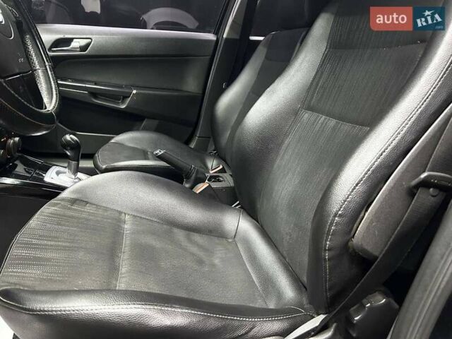 Черный Опель Астра, объемом двигателя 1.6 л и пробегом 213 тыс. км за 4300 $, фото 7 на Automoto.ua